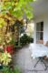 # Einfamilienhaus mit Ausblick ins Grüne, Doppelgarage und tollem Garten! Bezugsfrei! - 1. Terrasse im Osten
